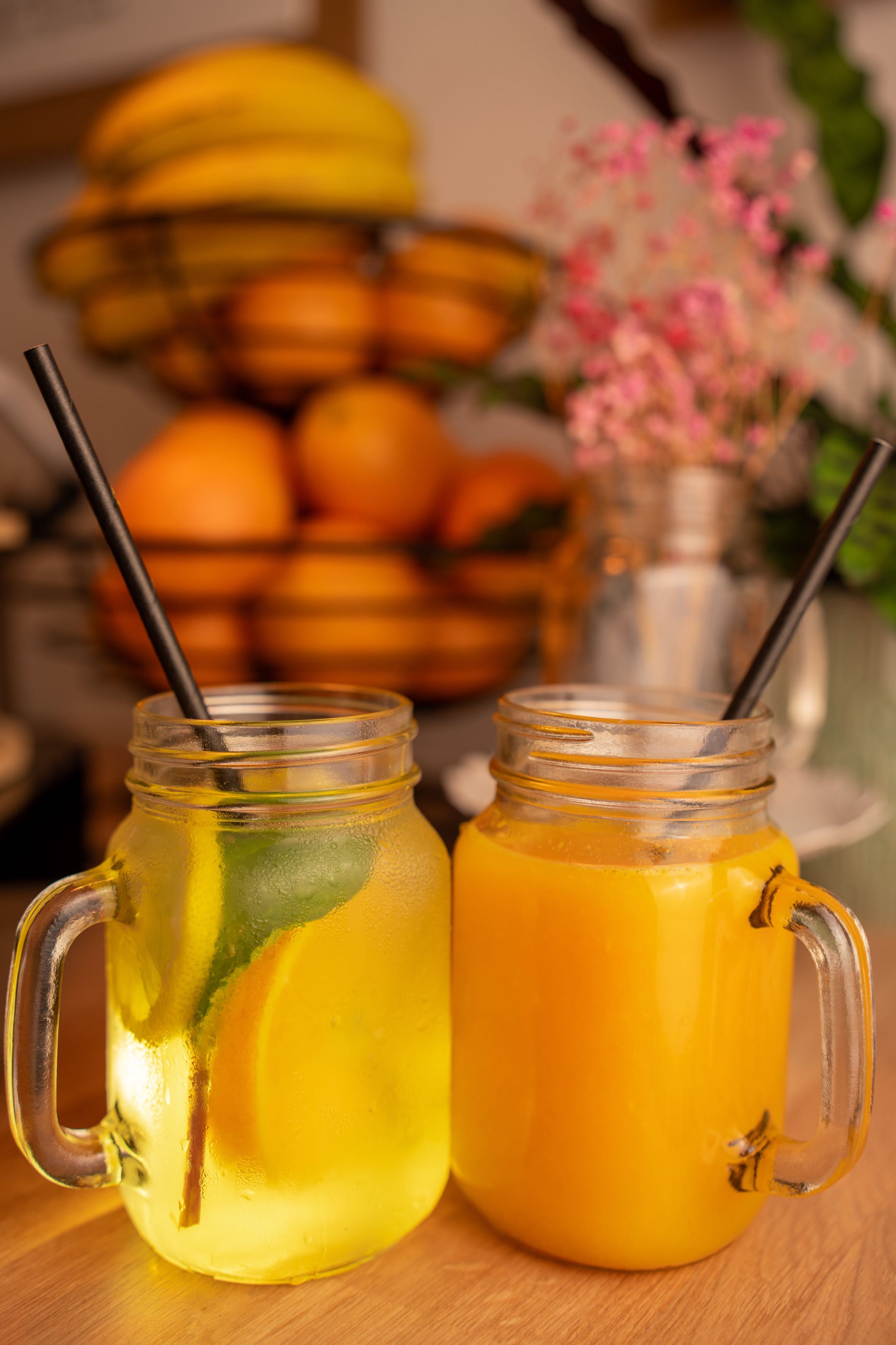 Original lemonade and fresh orange juice in mason jars at Cristina's Cafe Romford